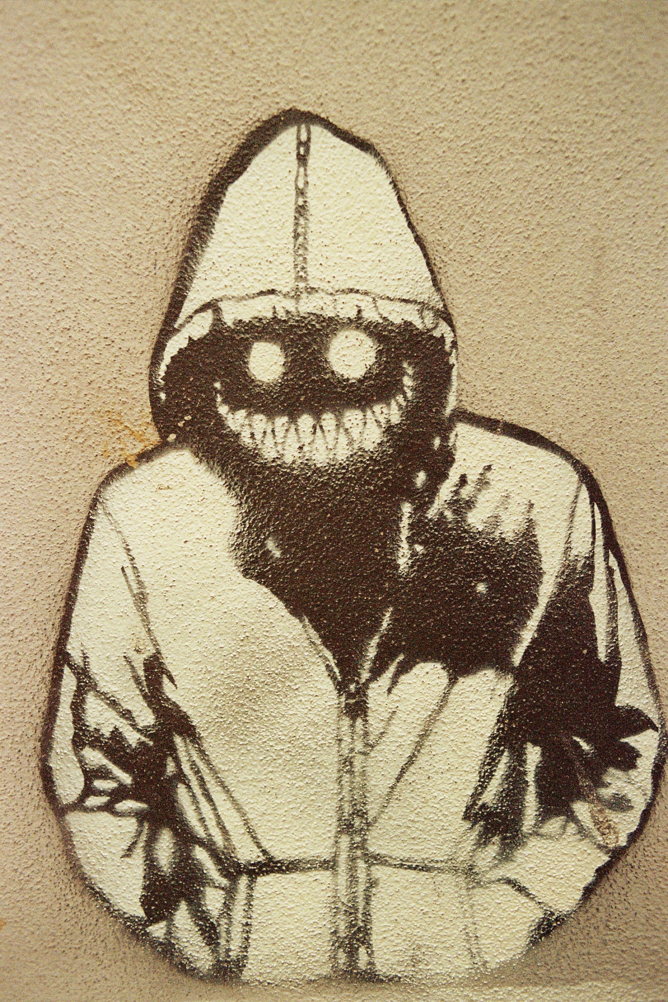 sepia sketch of hooded figure by Markus Spiske