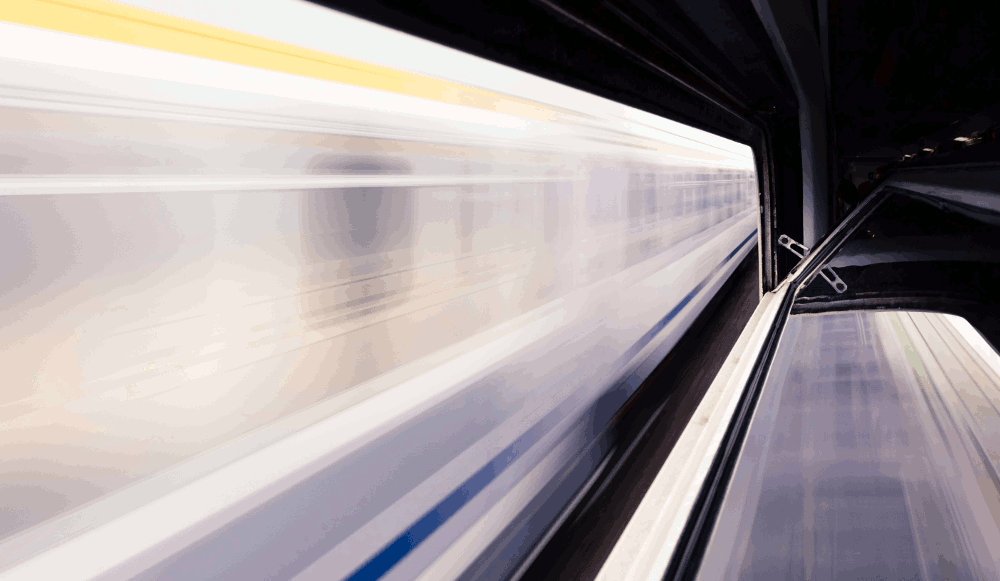 time-lapse speeding train by Martin Adams